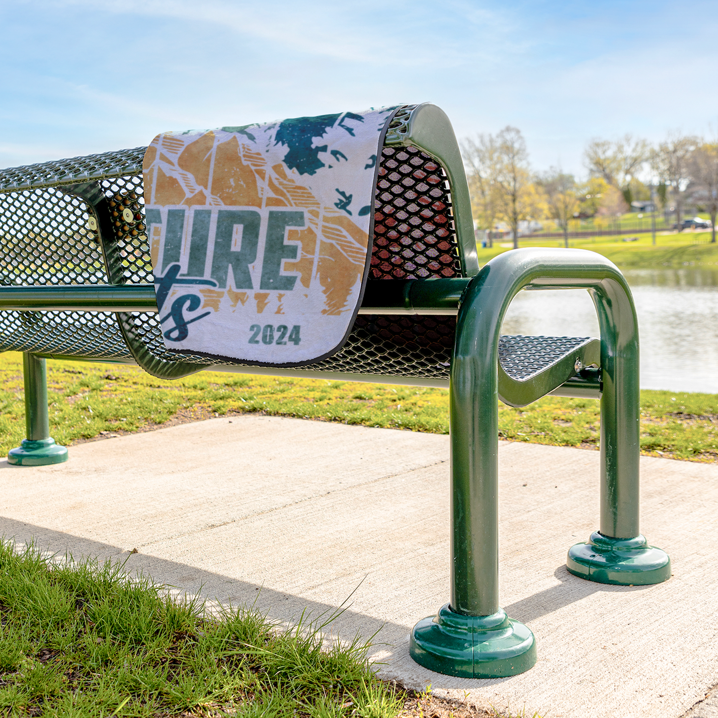 Adventure_Awaits_2_StadiumBlanket_Lifestyle_Bench_H_AS_Mockup.png