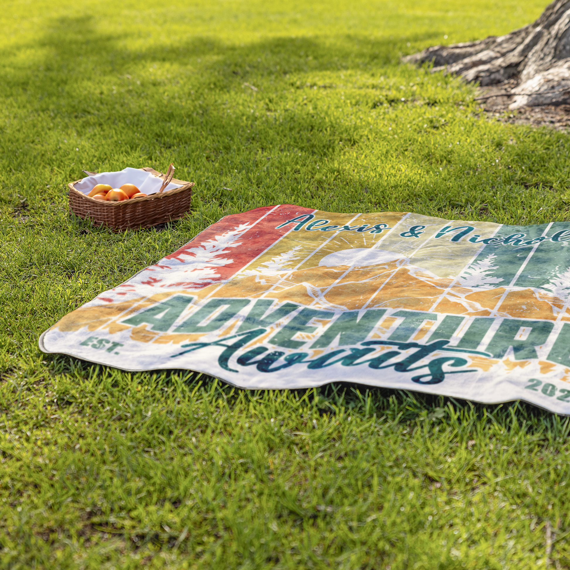 Adventure_Awaits_2_StadiumBlanket_Lifestyle_Grass_H_Mockup.png