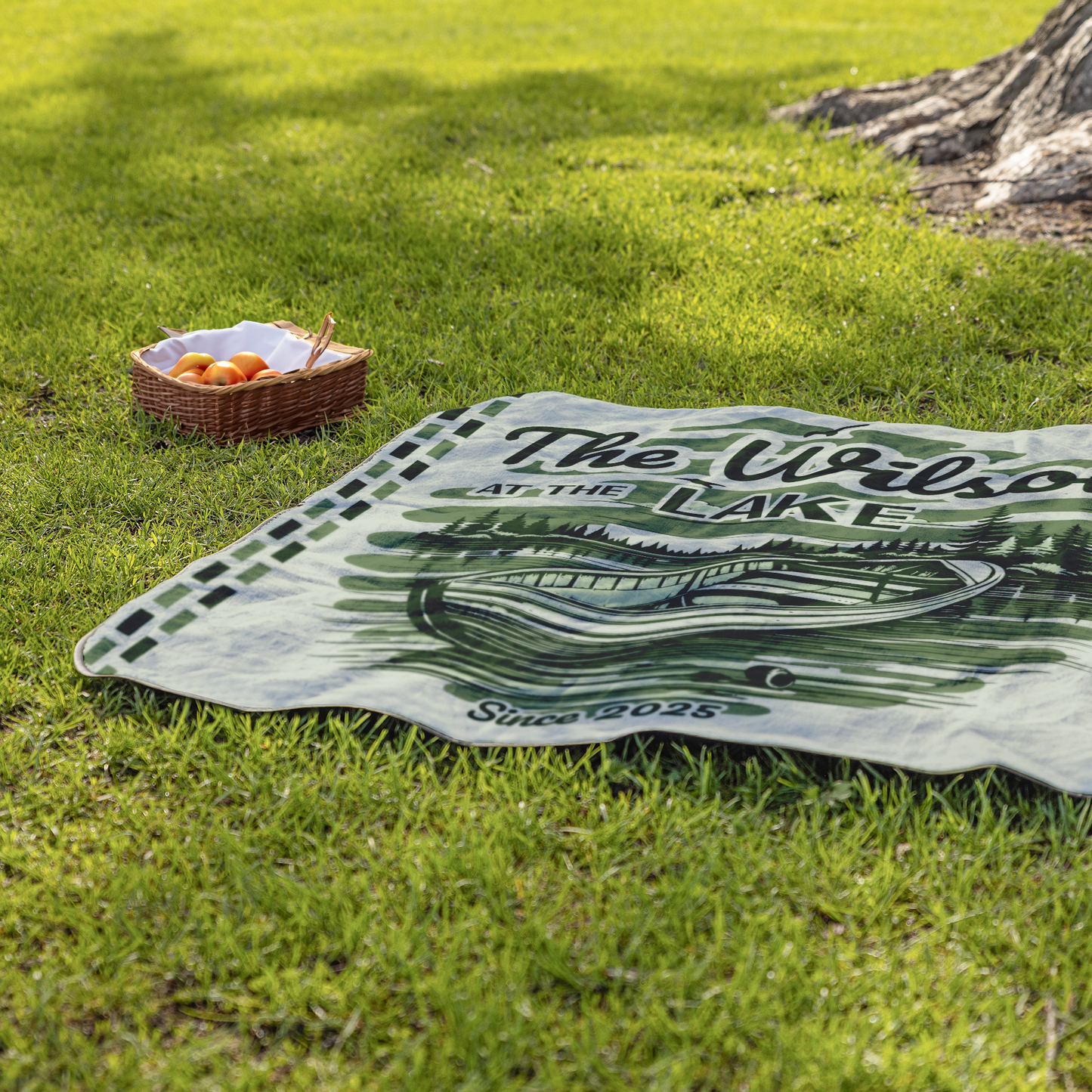 At_the_Lake_Blanket_StadiumBlanket_Lifestyle_Grass_H_Mockup.png