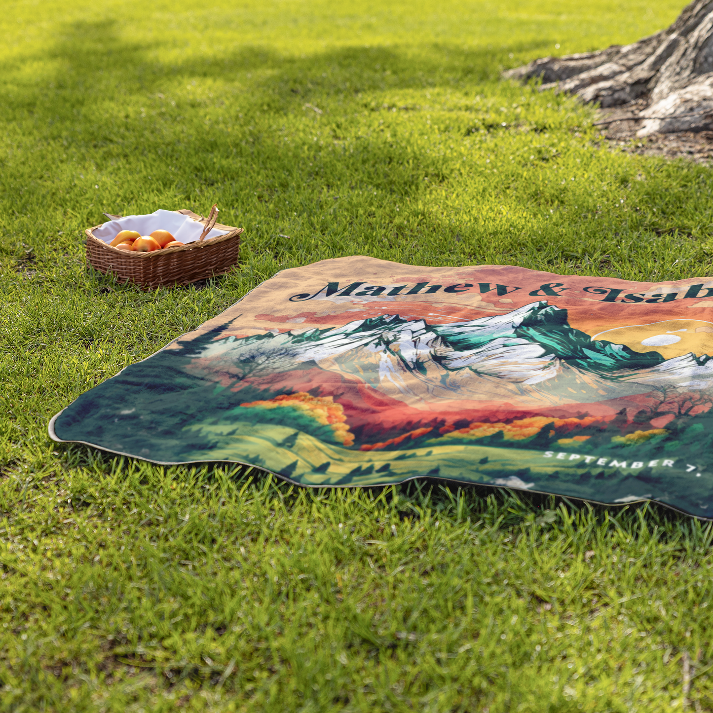 Mountain_Sunset_View_Blanket_StadiumBlanket_Lifestyle_Grass_H_Mockup.png