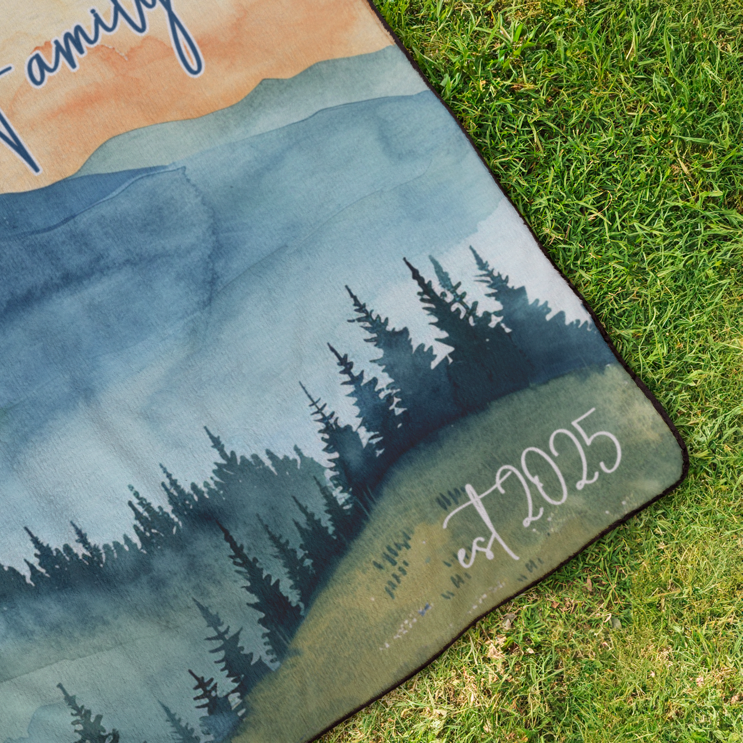 Sunset_Mountain_Blanket_StadiumBlanket_OverheadGrass_H_Mockup.png