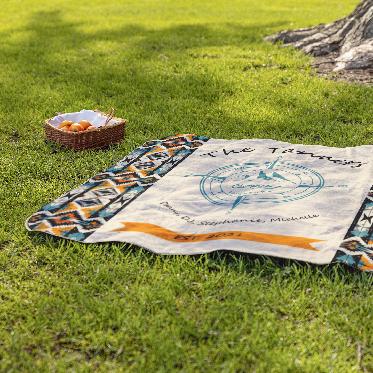 Tribal_Camping_Adventure_StadiumBlanket_Lifestyle_Grass_H_Mockup.png