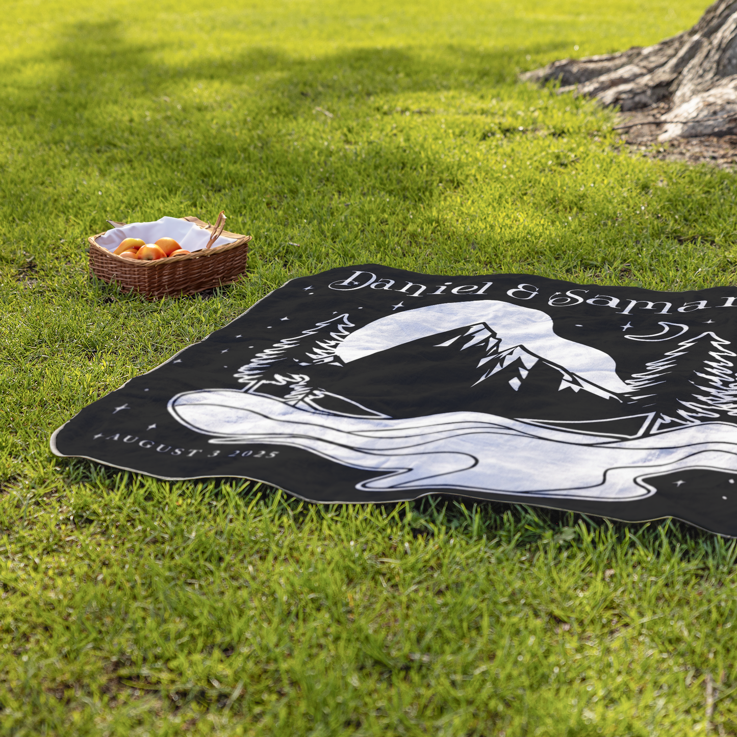 Mountain_Night_Sky_StadiumBlanket_Lifestyle_Grass_H_Mockup.png