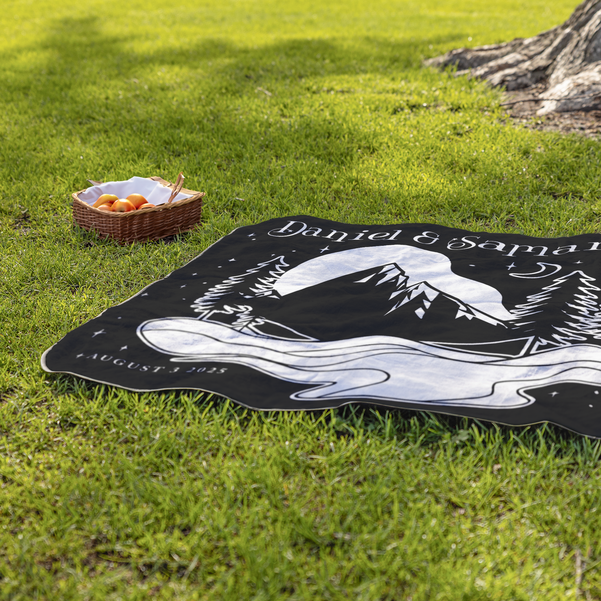 Mountain_Night_Sky_StadiumBlanket_Lifestyle_Grass_H_Mockup.png